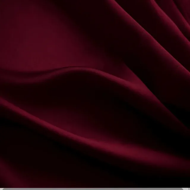 Wine Cascade backdrop: burgundy fabric falling in soft folds