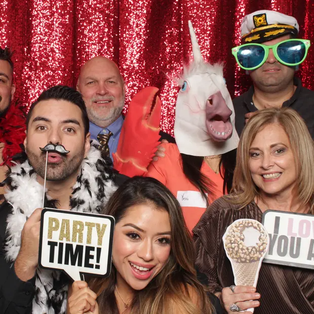 Guests in the Trendy Booth, lit evenly by studio lighting