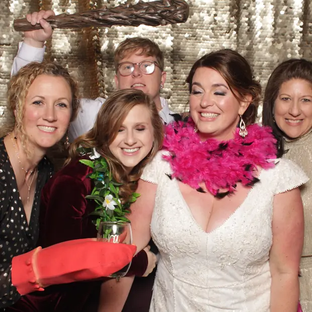 Guests in the Trendy Booth, lit evenly by studio lighting