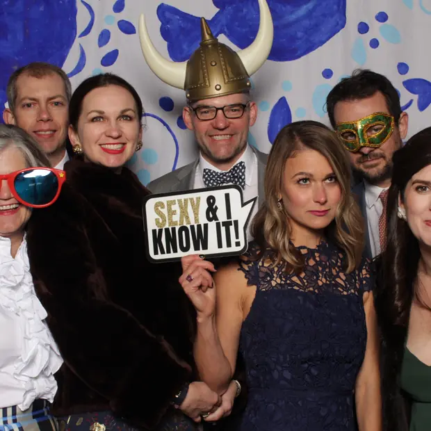 Guests in the Trendy Booth, lit evenly by studio lighting